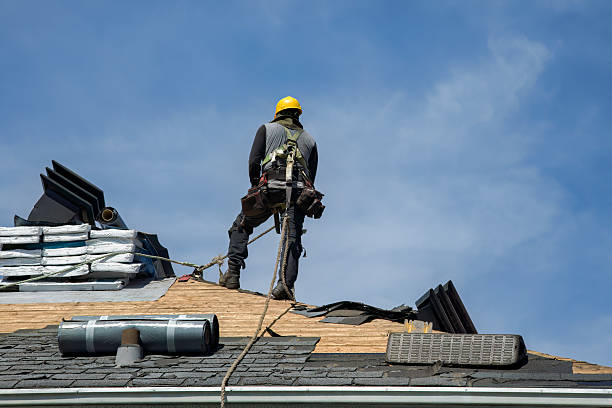 Professional Roof Installation technician working in Mc Dade, TX